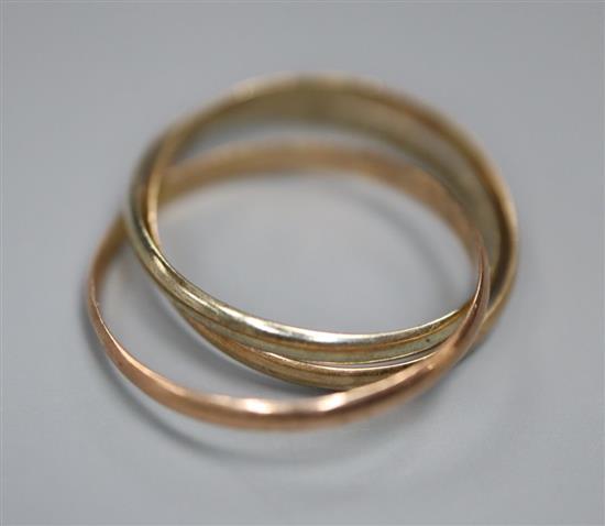 A 9ct tri-colour gold ring band, size N, 1.7 grams.